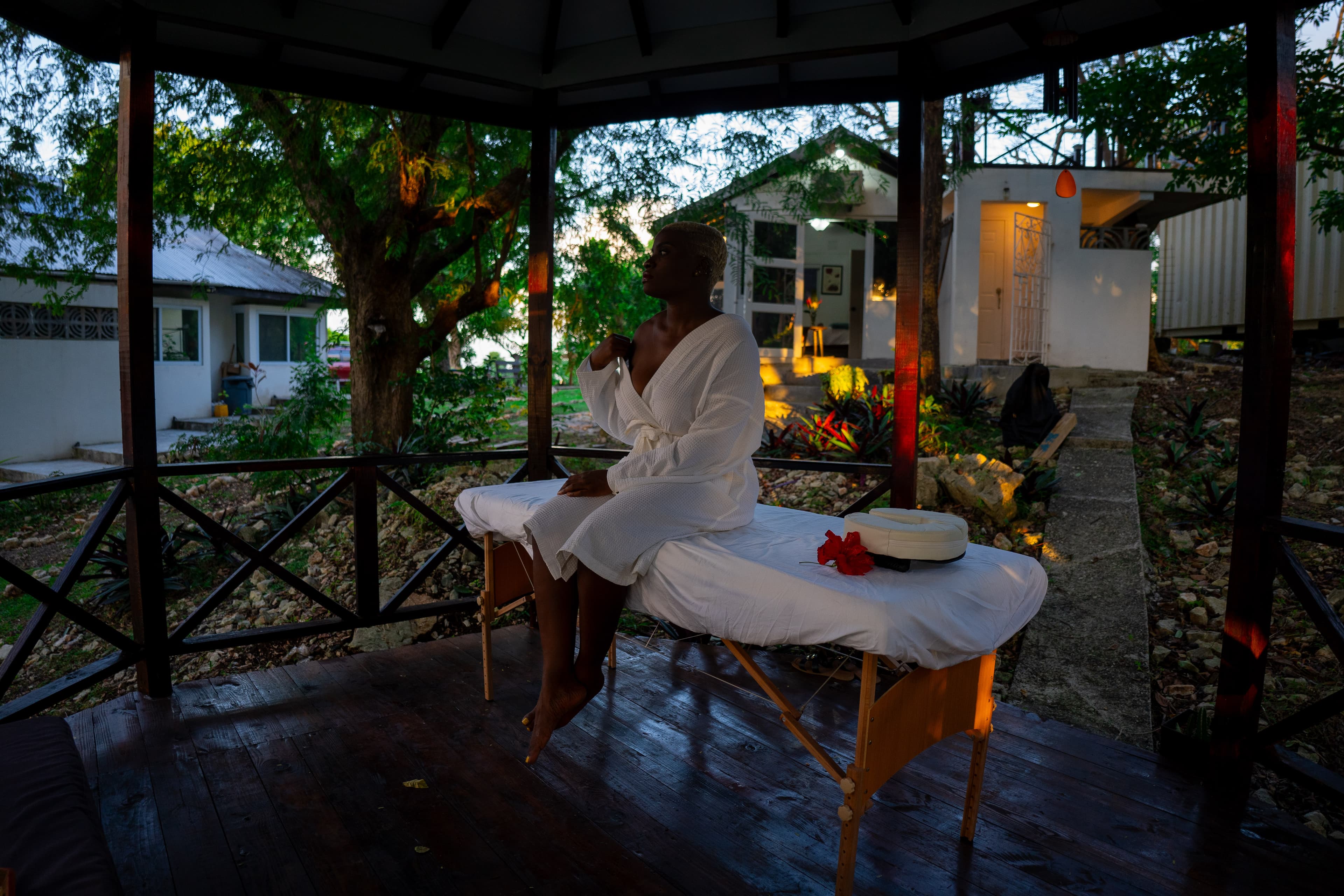 Person meditating peacefully at sunrise